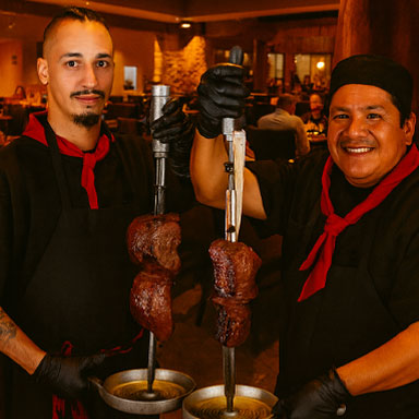 Photo of Pampas Las Vegas employees holding up meet ready to carve